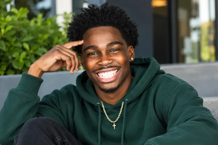 Kam Patterson net worth breakdown featuring the young comedian performing live on stage in Austin Texas